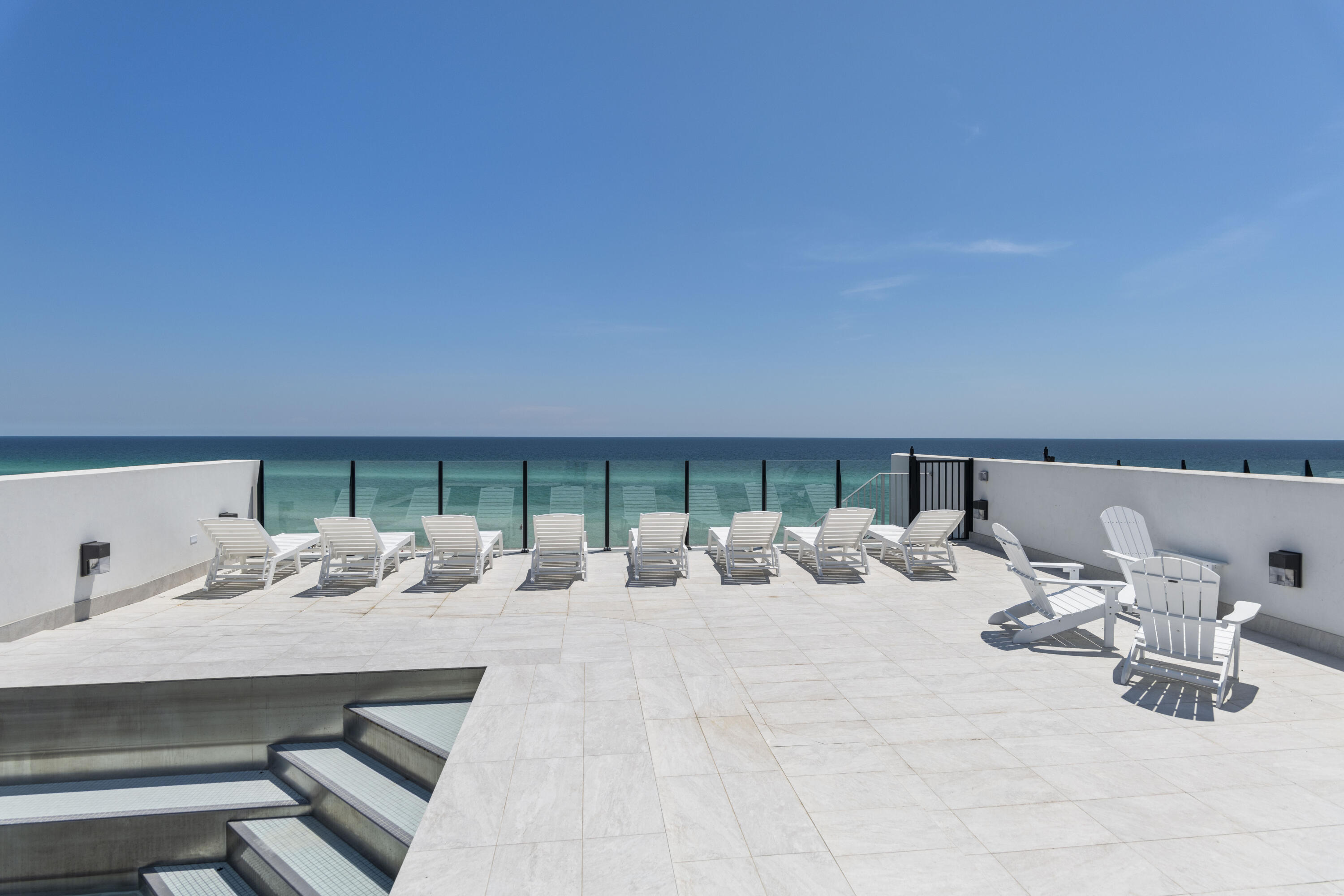 26 Azzurro Way, Unit B Santa Rosa Beach, FL 32459 - Photo 29 of 34 a view of a chairs and table in the patio