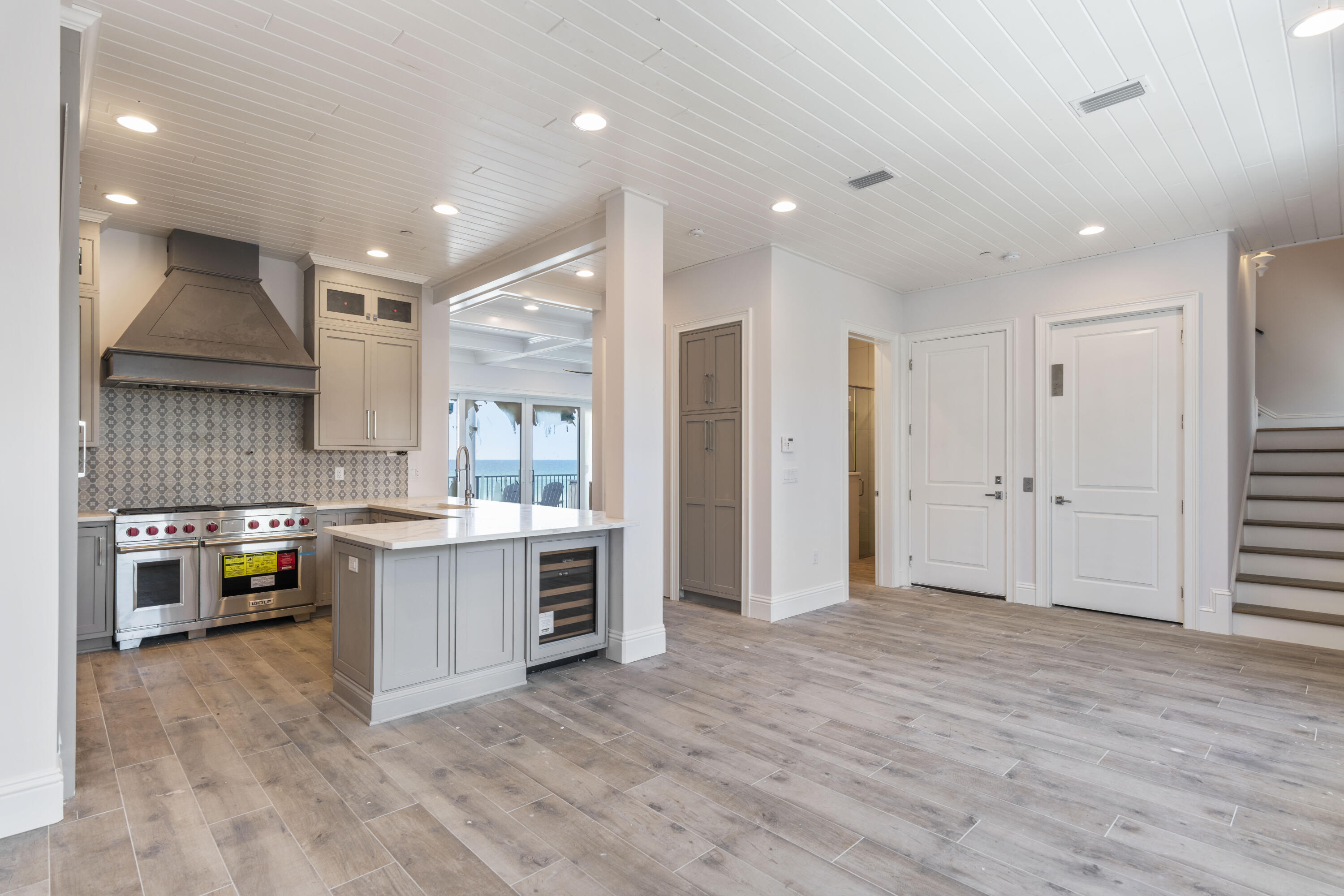 26 Azzurro Way, Unit B Santa Rosa Beach, FL 32459 - Photo 8 of 34 a view of kitchen with stainless steel appliances granite countertop a stove and a sink