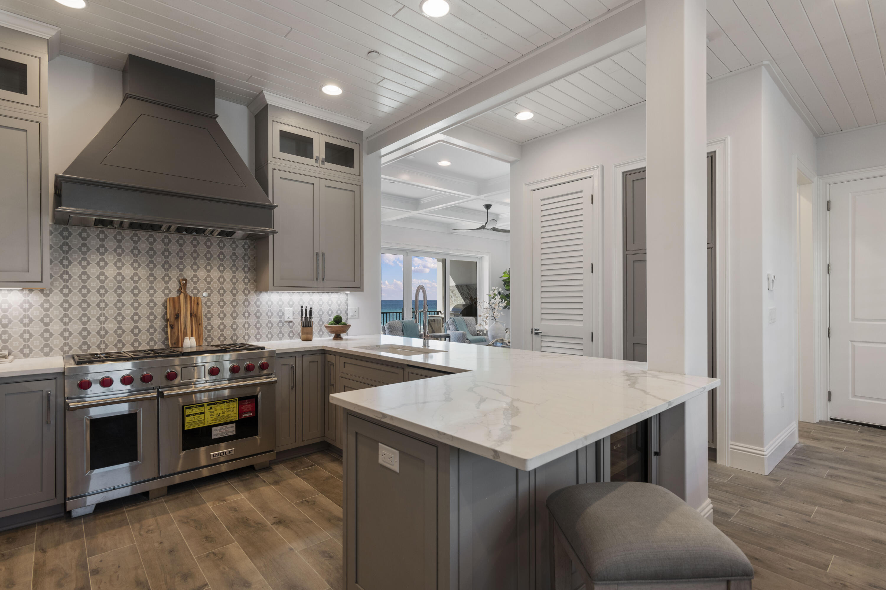 26 Azzurro Way, Unit B Santa Rosa Beach, FL 32459 - Photo 9 of 34 a kitchen with a stove a sink and a refrigerator