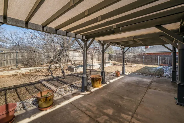 a view of a porch with wooden floor