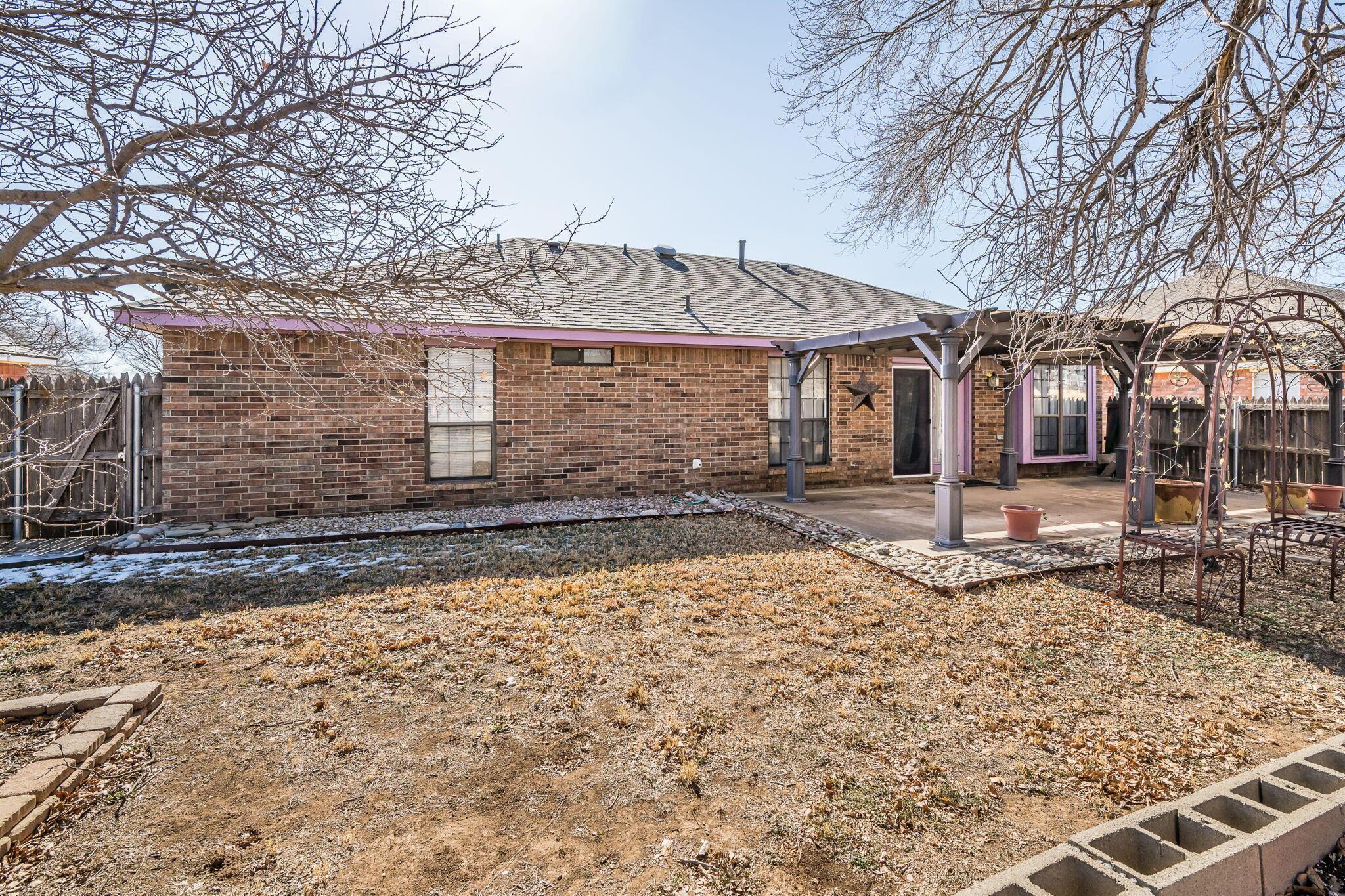 2904 Laguna Drive Amarillo, TX 79110 - Photo 17 of 17 a front view of a house with a yard