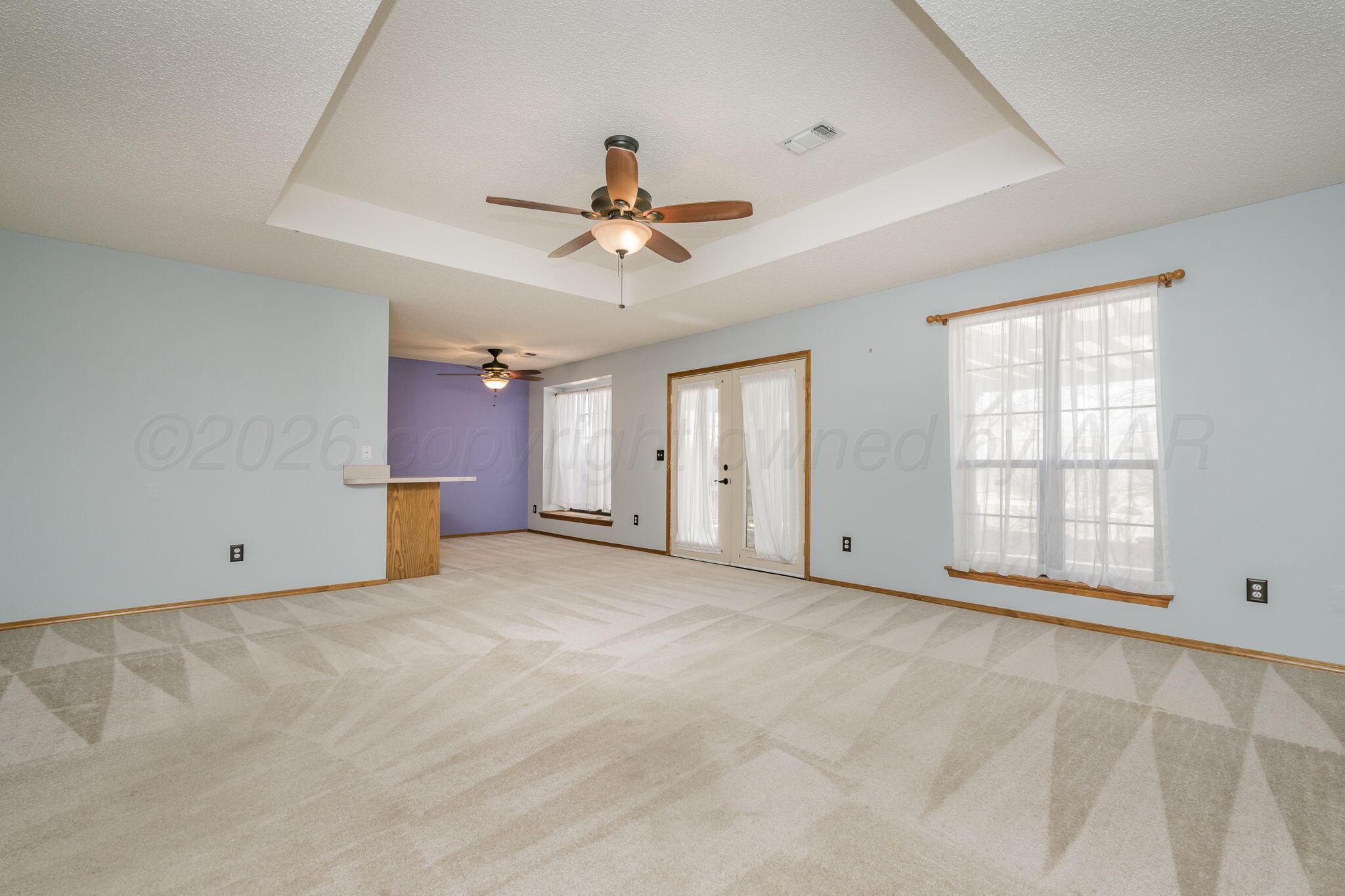 2904 Laguna Drive Amarillo, TX 79110 - Photo 2 of 17 a view of an empty room with a window