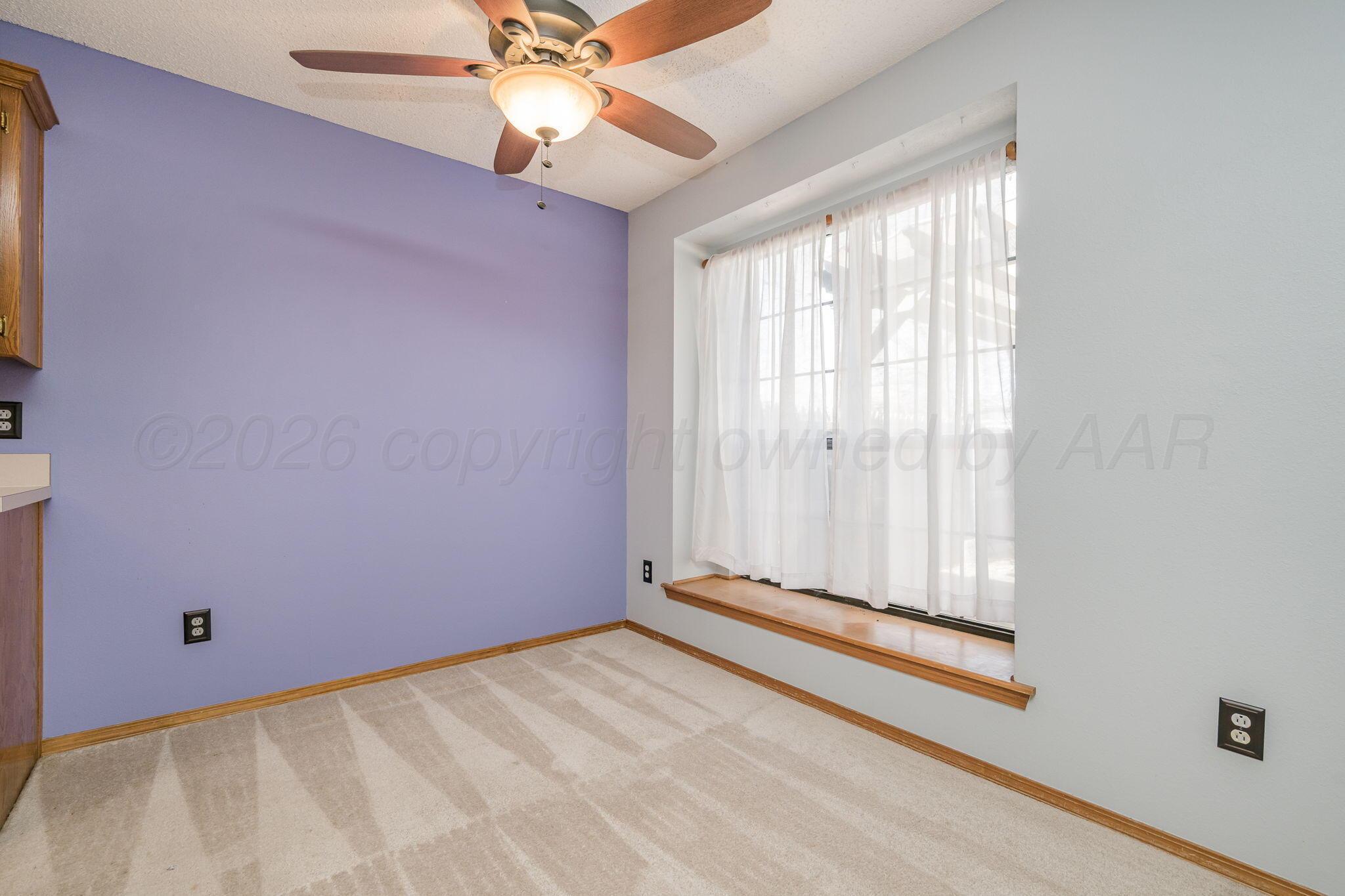 2904 Laguna Drive Amarillo, TX 79110 - Photo 3 of 17 a view of an empty room with a window