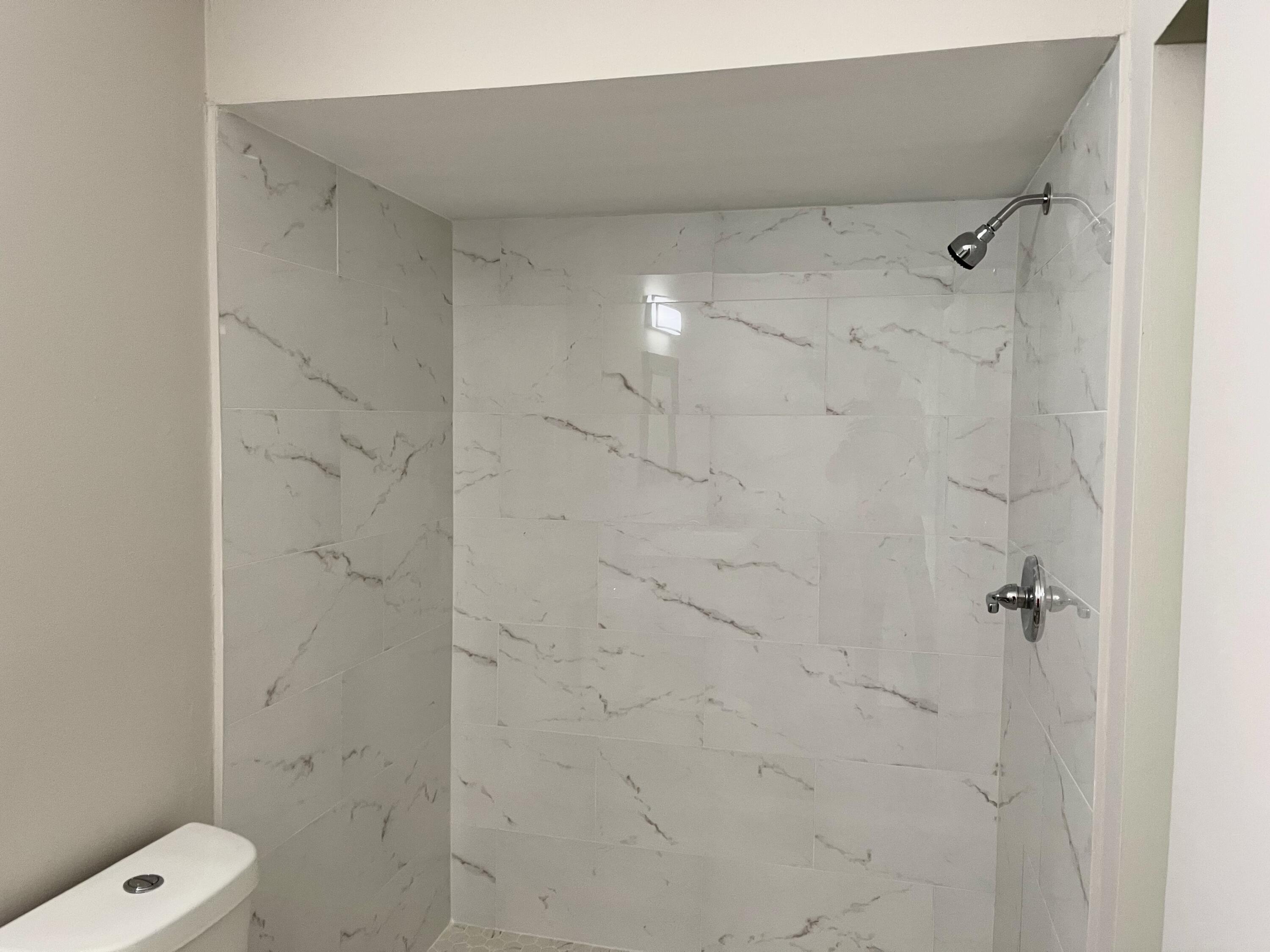 2030 Colonial Road, Unit B4 Fort Pierce, FL 34950 - Photo 17 of 19 New tile shower