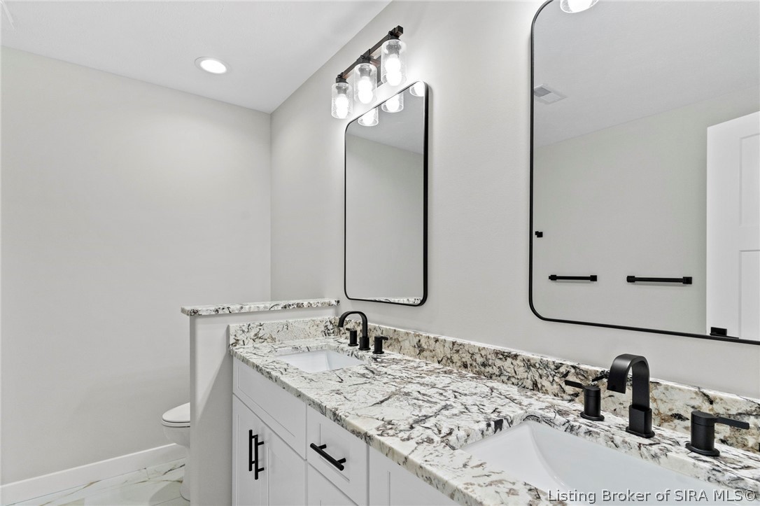 110 West Greene Court Hanover, IN 47243 - Photo 16 of 26 Primary Ensuite Bathroom with double vanity and shower