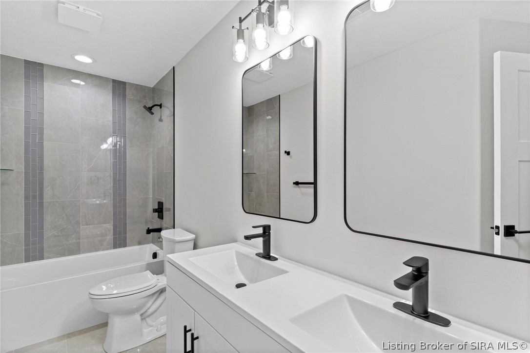 110 West Greene Court Hanover, IN 47243 - Photo 18 of 26 Bathroom #2 with double vanity and tiled tub/shower