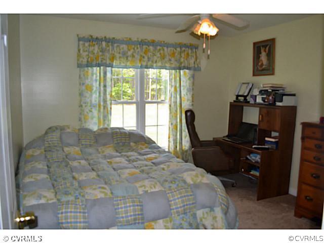 1541 Johns Road Carson, VA 23830 - Photo 12 of 24 a bedroom with bed and window