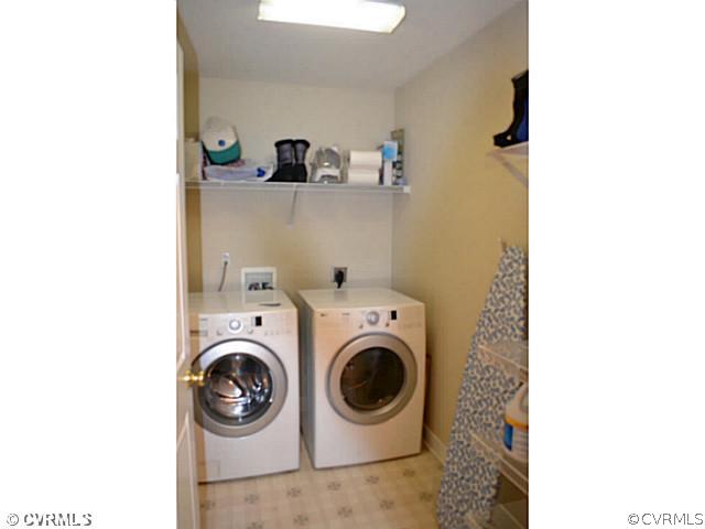 1541 Johns Road Carson, VA 23830 - Photo 15 of 24 a utility room with dryer and washer