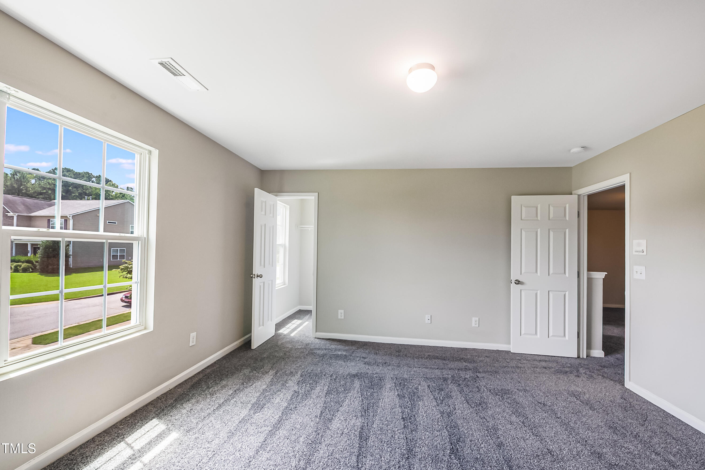 1116 Crendall Way Wake Forest, NC 27587 - Photo 11 of 33 a view of an empty room with a window