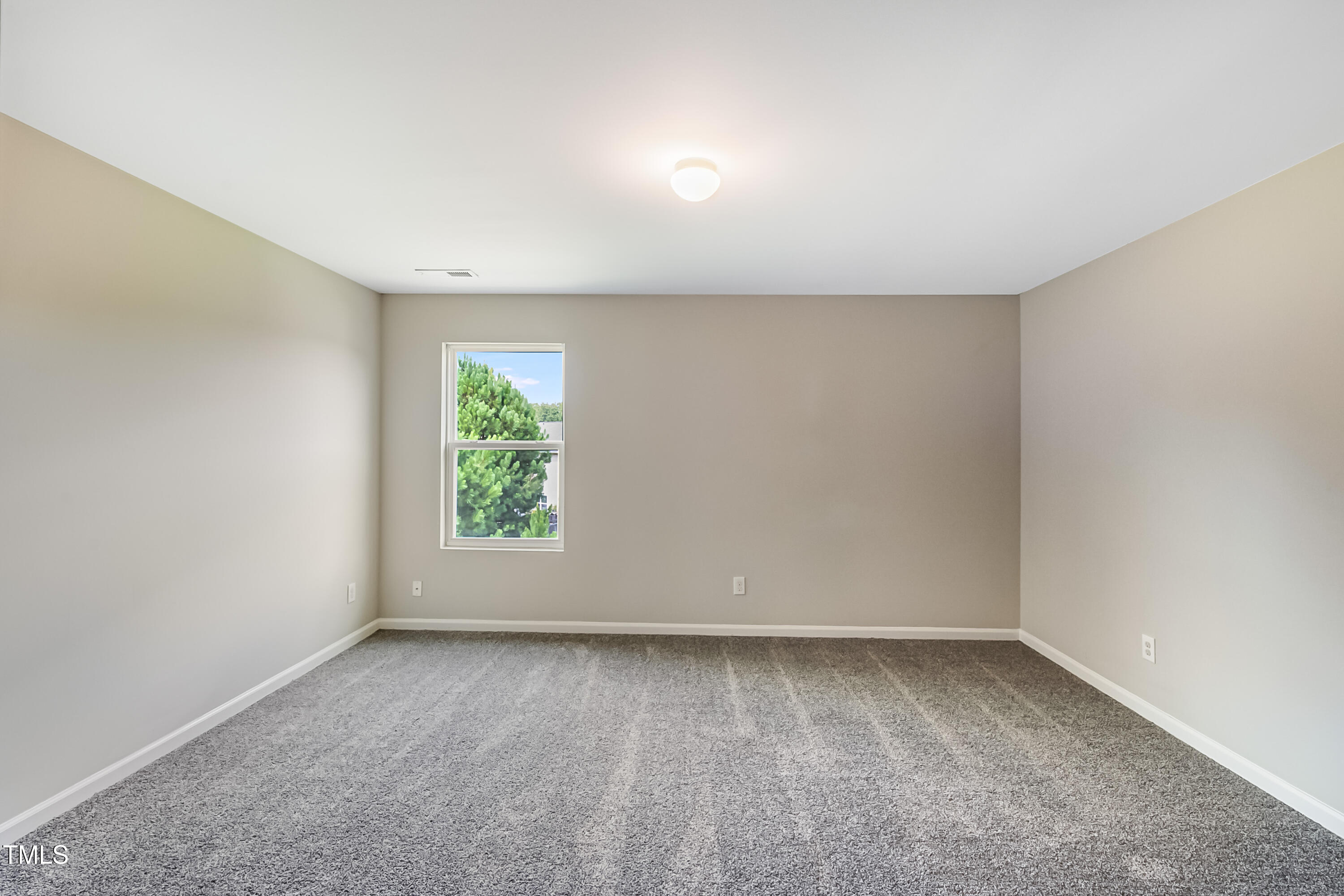 1116 Crendall Way Wake Forest, NC 27587 - Photo 15 of 33 an empty room with a window