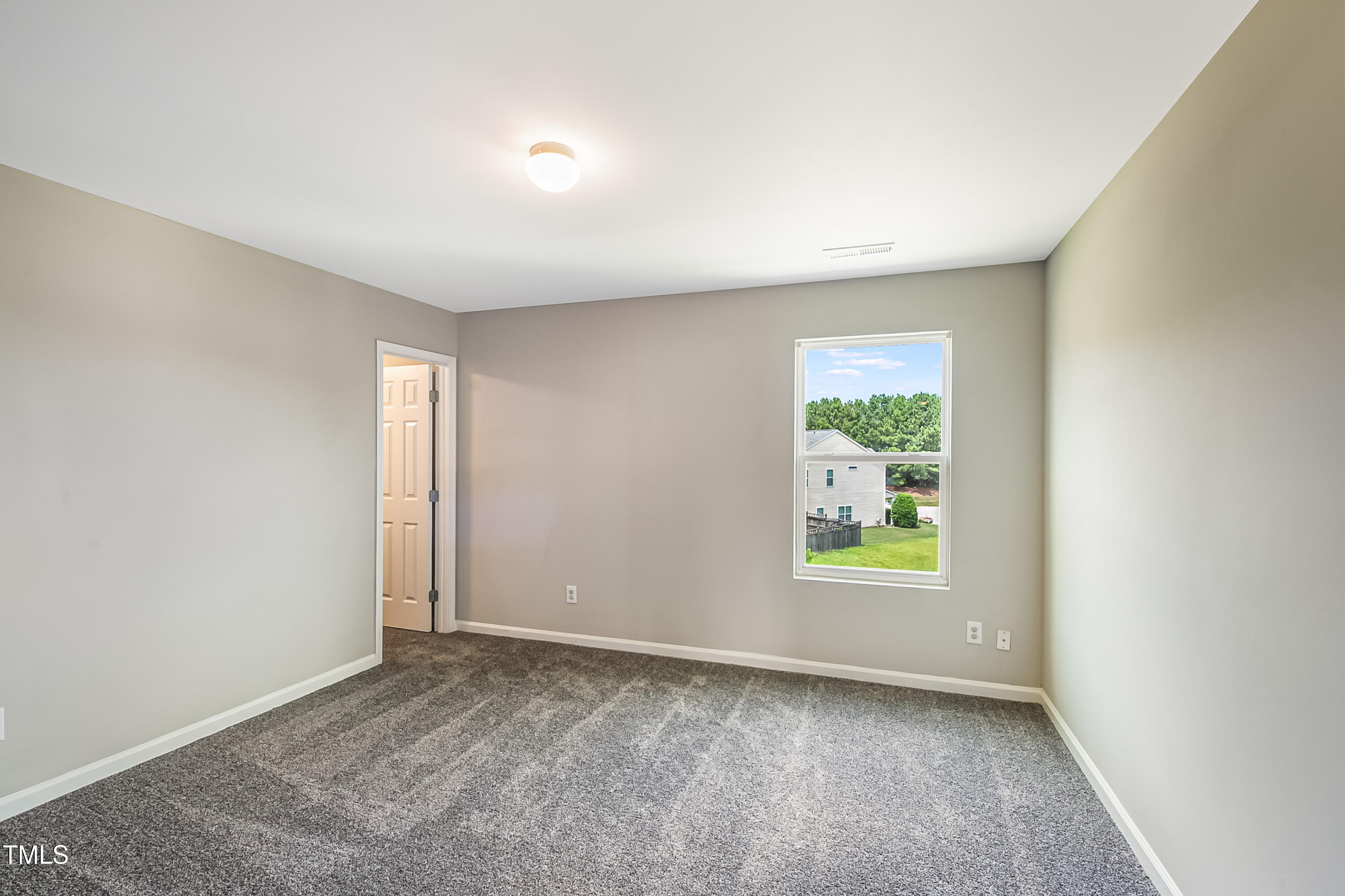 1116 Crendall Way Wake Forest, NC 27587 - Photo 17 of 33 an empty room with windows