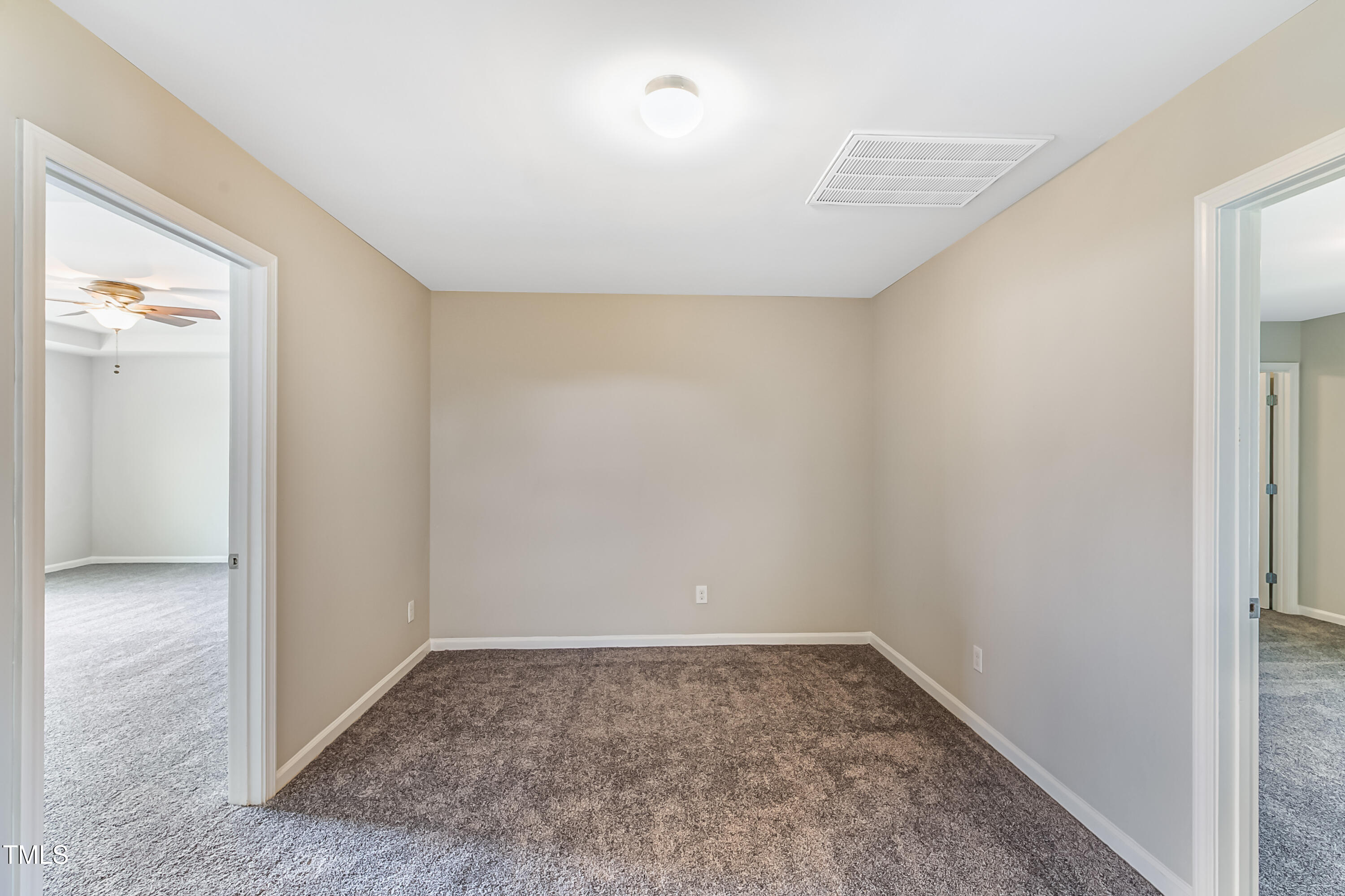 1116 Crendall Way Wake Forest, NC 27587 - Photo 18 of 33 an empty room with a bench
