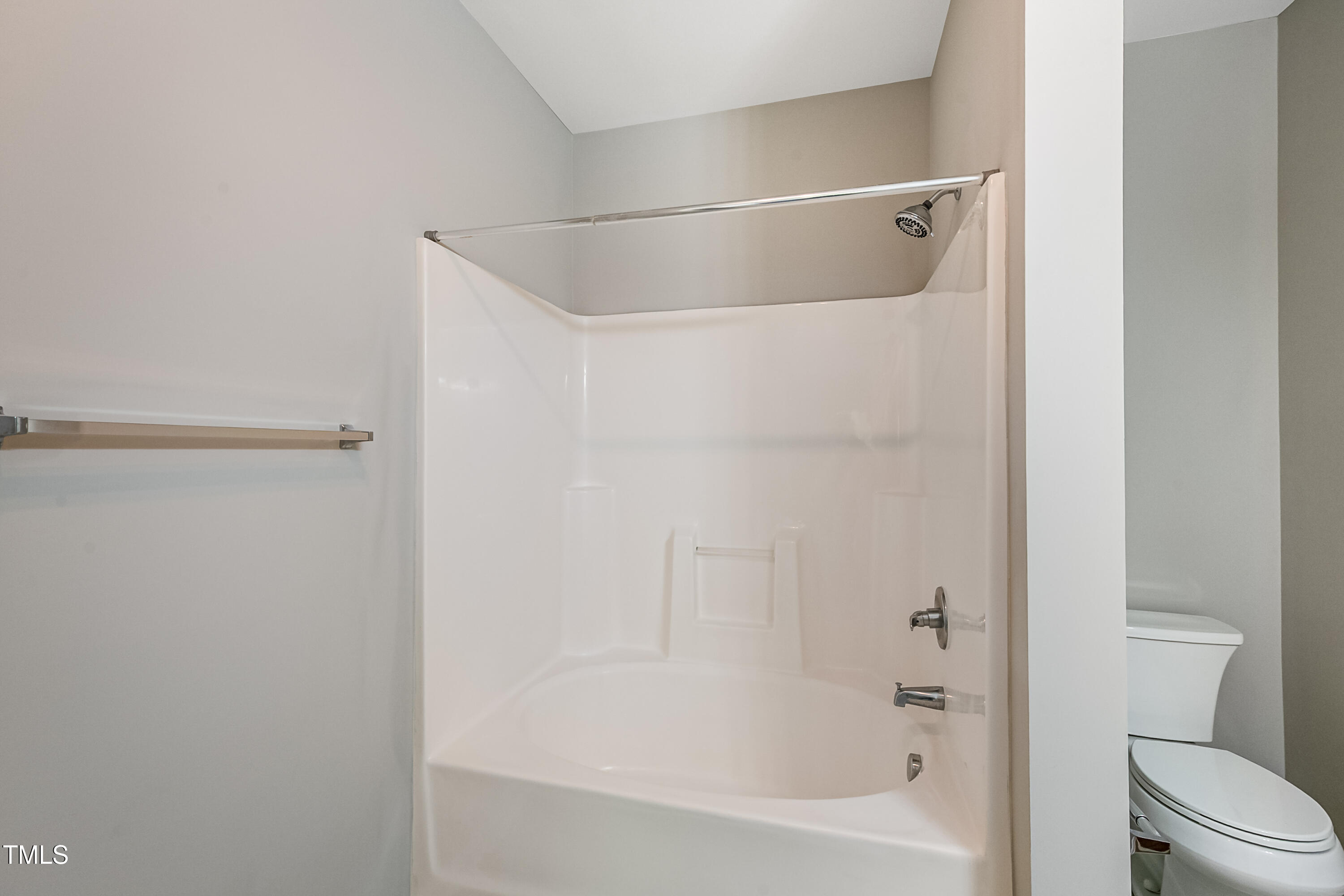 1116 Crendall Way Wake Forest, NC 27587 - Photo 25 of 33 a bathroom with a bathtub and a shower