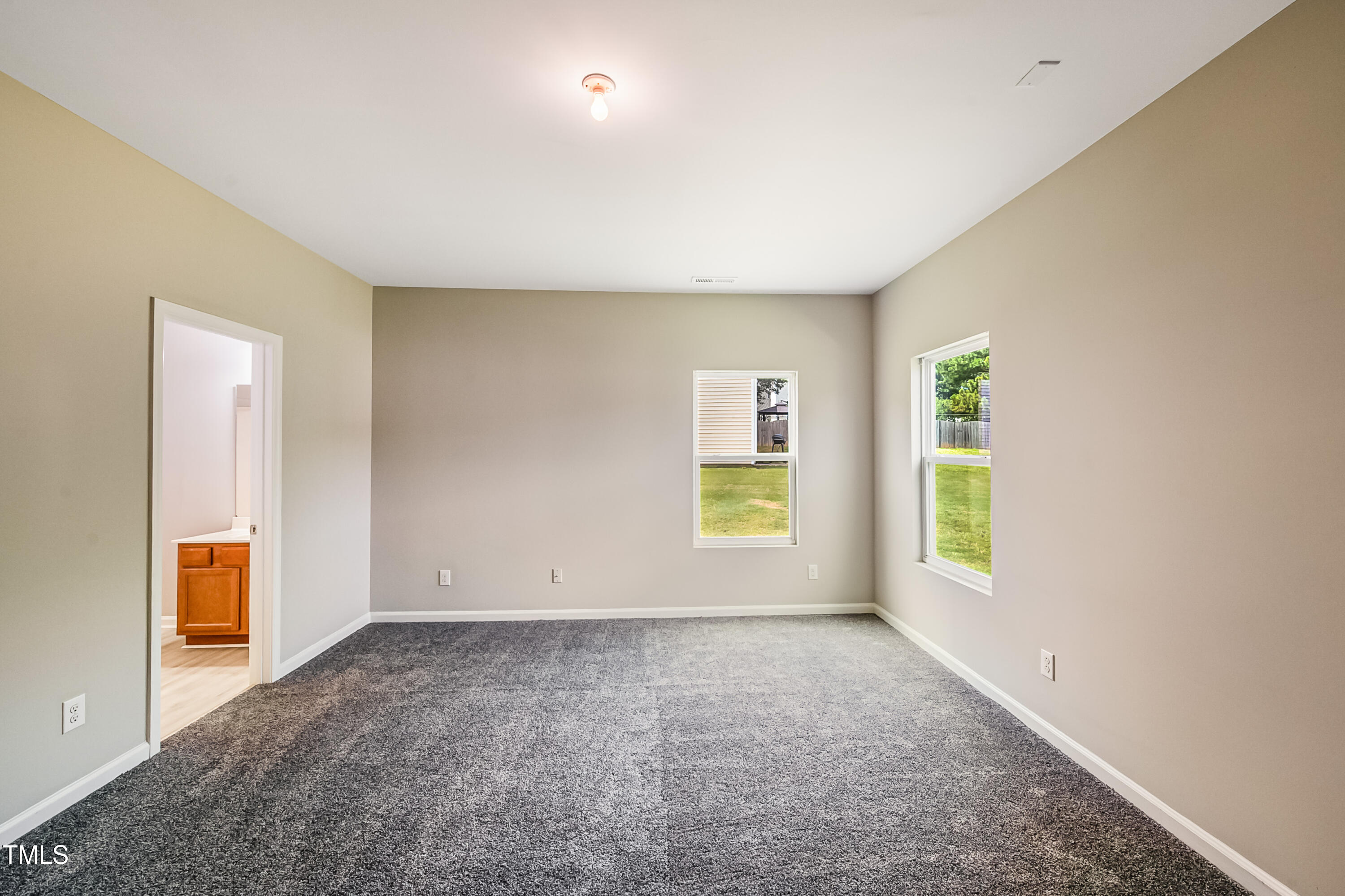 1116 Crendall Way Wake Forest, NC 27587 - Photo 30 of 33 an empty room with windows