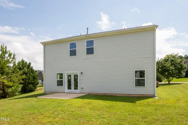 a front view of house with yard