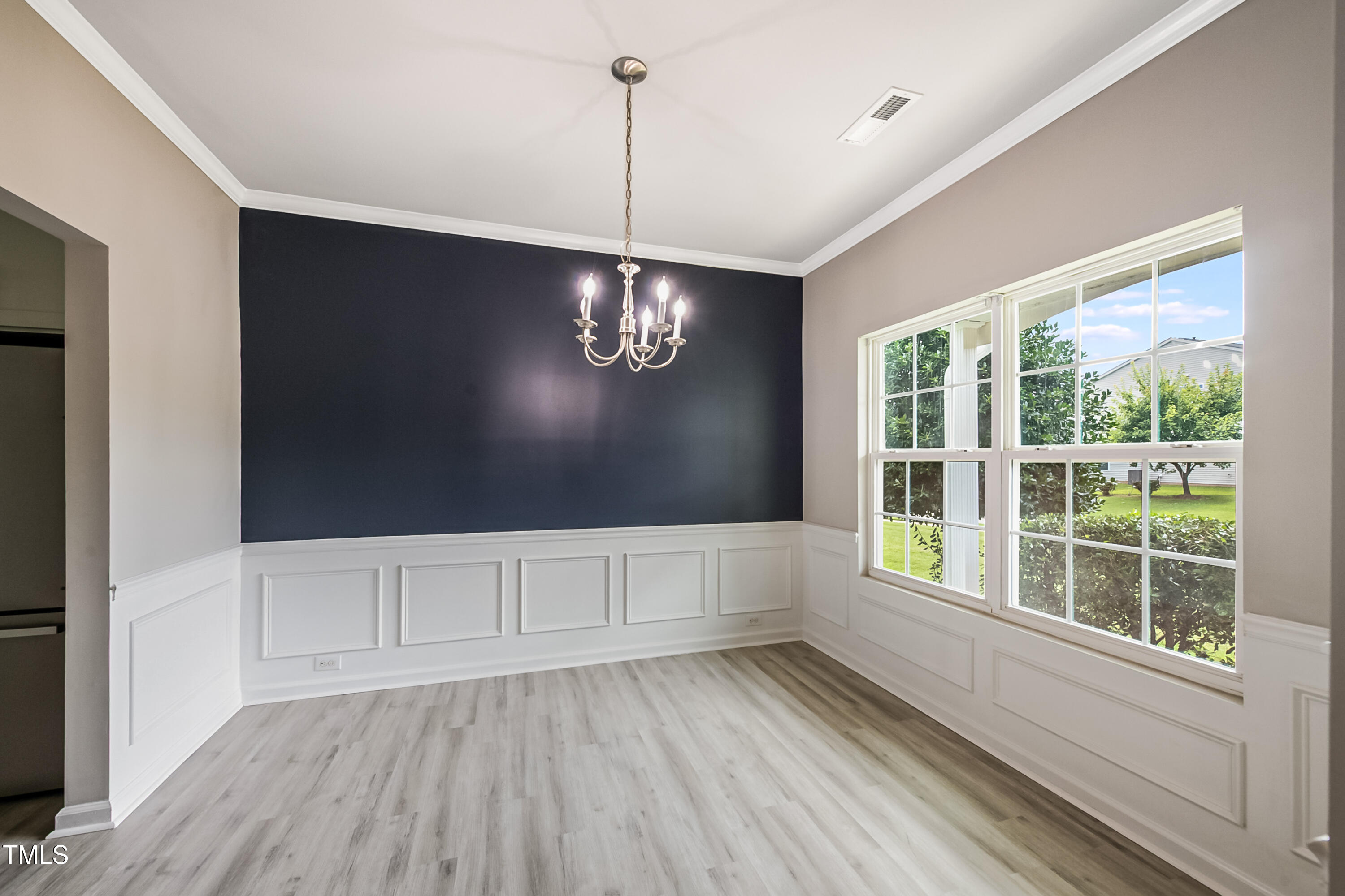 1116 Crendall Way Wake Forest, NC 27587 - Photo 4 of 33 a view of an empty room with a window