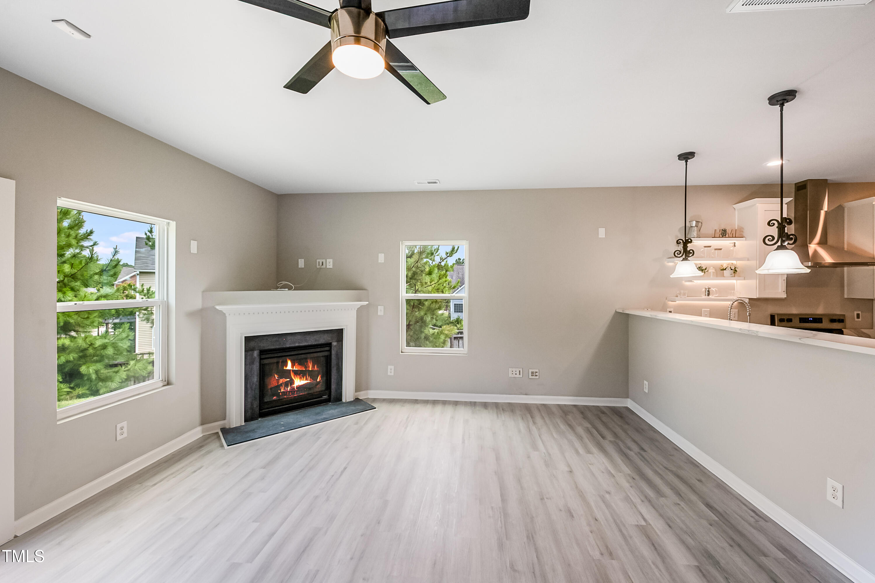1116 Crendall Way Wake Forest, NC 27587 - Photo 10 of 33 a view of a room window and wooden floor