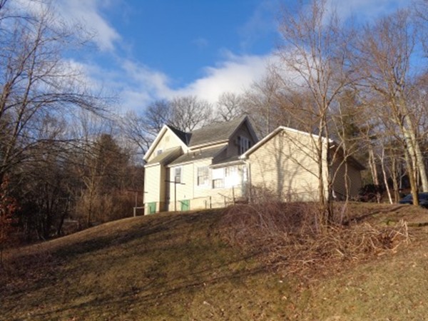 158 Bumstead Road Monson, MA 01057 - Photo 4 of 15 a view of backyard with large trees