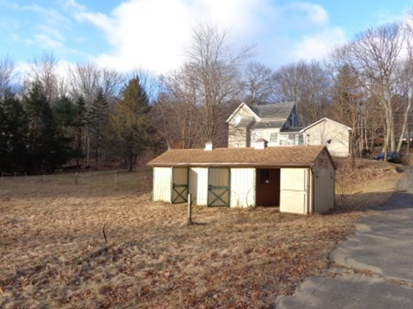 158 Bumstead Road Monson, MA 01057 - Photo 6 of 15 a front view of a house with a yard