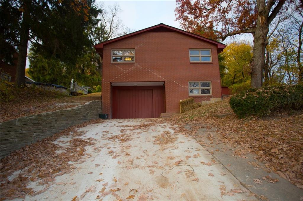 6902 Merton Road Ben Avon, PA 15202 - Photo 22 of 25 Street view of house. 2 car wide driveway, a HEATED driveway!