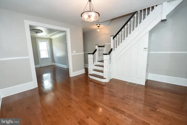 a view of entryway with wooden floor