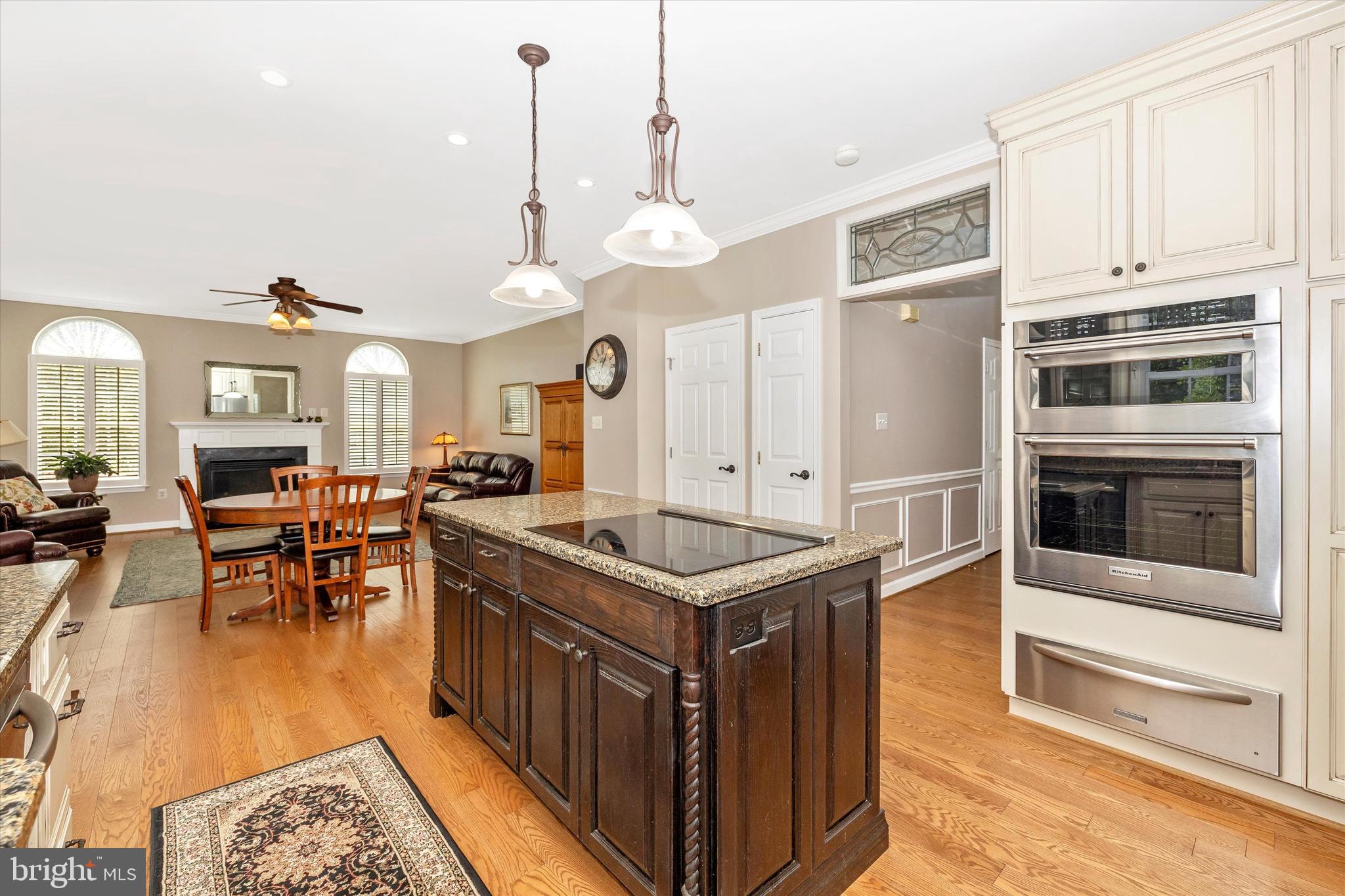 6341 Claridge Drive North Frederick, MD 21701 - Photo 11 of 54 a kitchen with stainless steel appliances granite countertop a stove a sink and a refrigerator