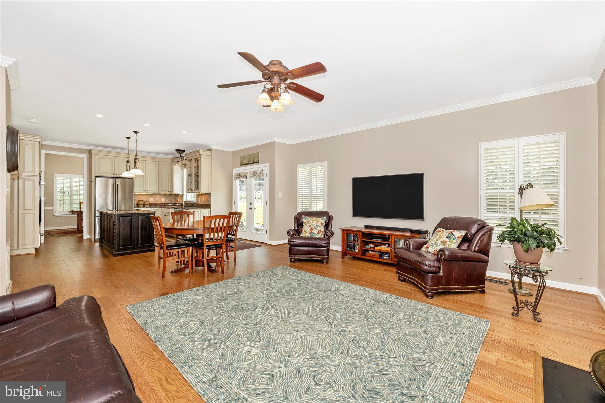 6341 Claridge Drive North Frederick, MD 21701 - Photo 14 of 54 a living room with furniture and a flat screen tv