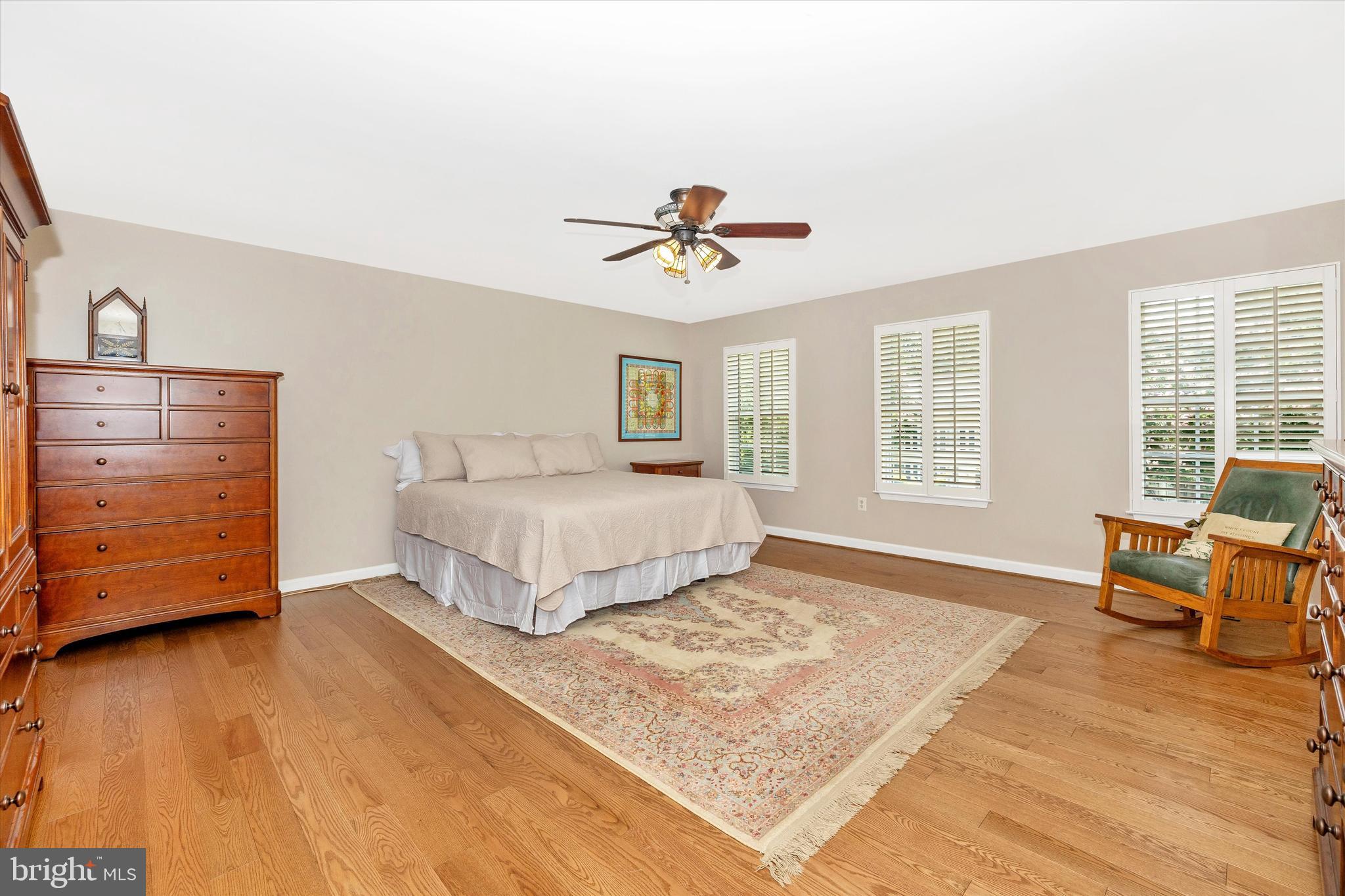 6341 Claridge Drive North Frederick, MD 21701 - Photo 18 of 54 a bedroom with a bed and wooden floor