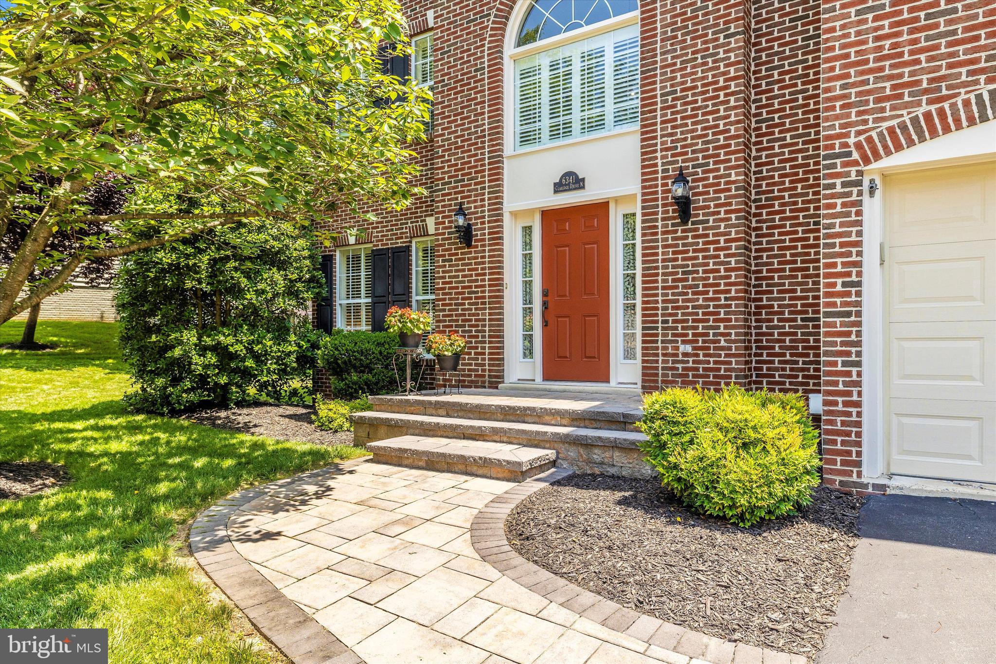 6341 Claridge Drive North Frederick, MD 21701 - Photo 2 of 54 a view of a backyard with potted plants