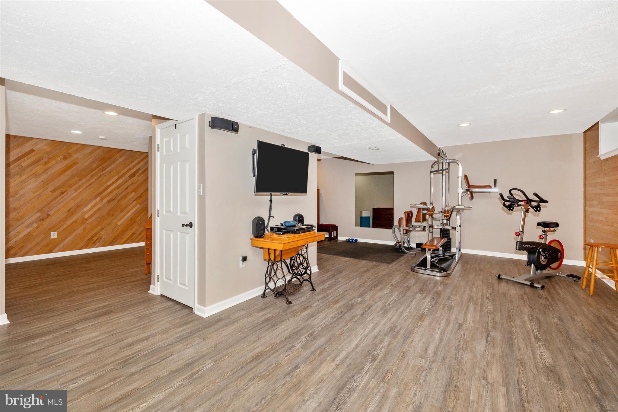 6341 Claridge Drive North Frederick, MD 21701 - Photo 30 of 54 a view of a livingroom with furniture and a flat screen tv