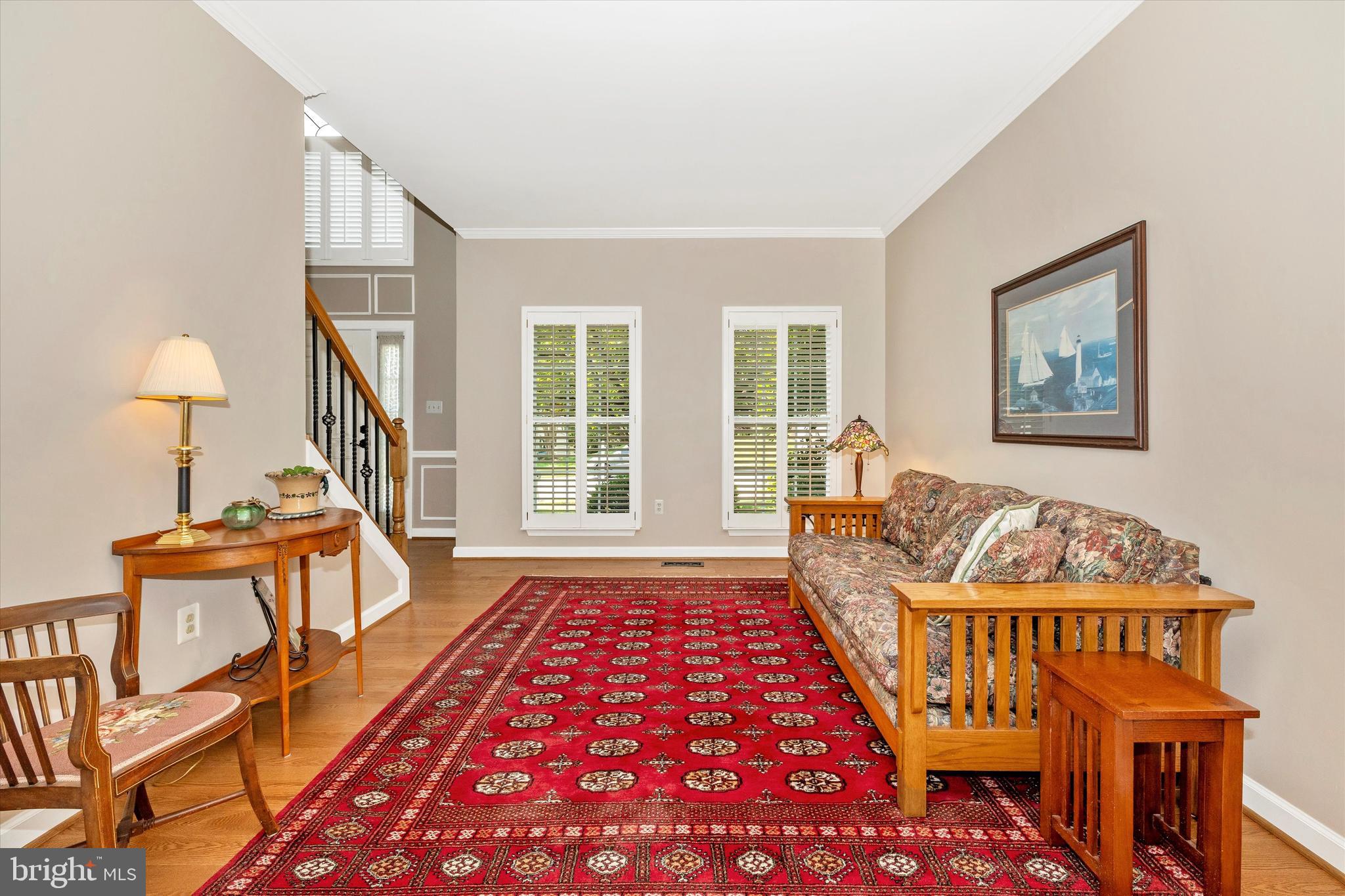 6341 Claridge Drive North Frederick, MD 21701 - Photo 4 of 54 a living room with furniture and a rug