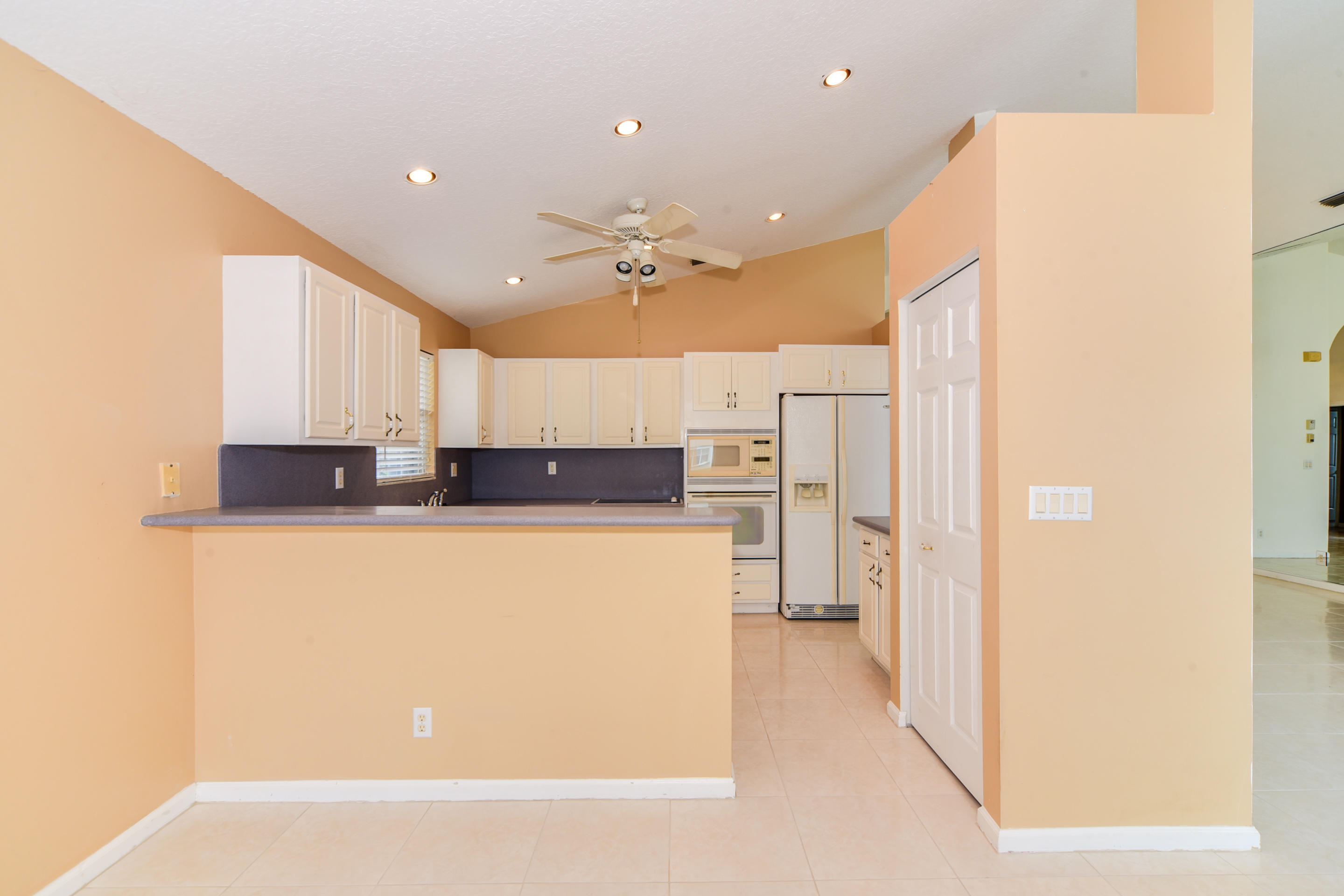 172 Cove Road Greenacres, FL 33413 - Photo 11 of 39 COVE KITCHEN VIEW