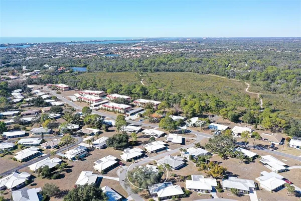 an aerial view of a city with lots of residential buildings