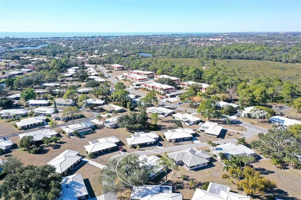 an aerial view of a city with lots of residential buildings