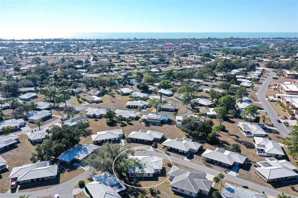 an aerial view of a city with lots of residential buildings