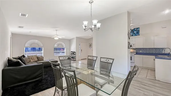 a view of a dining room with furniture