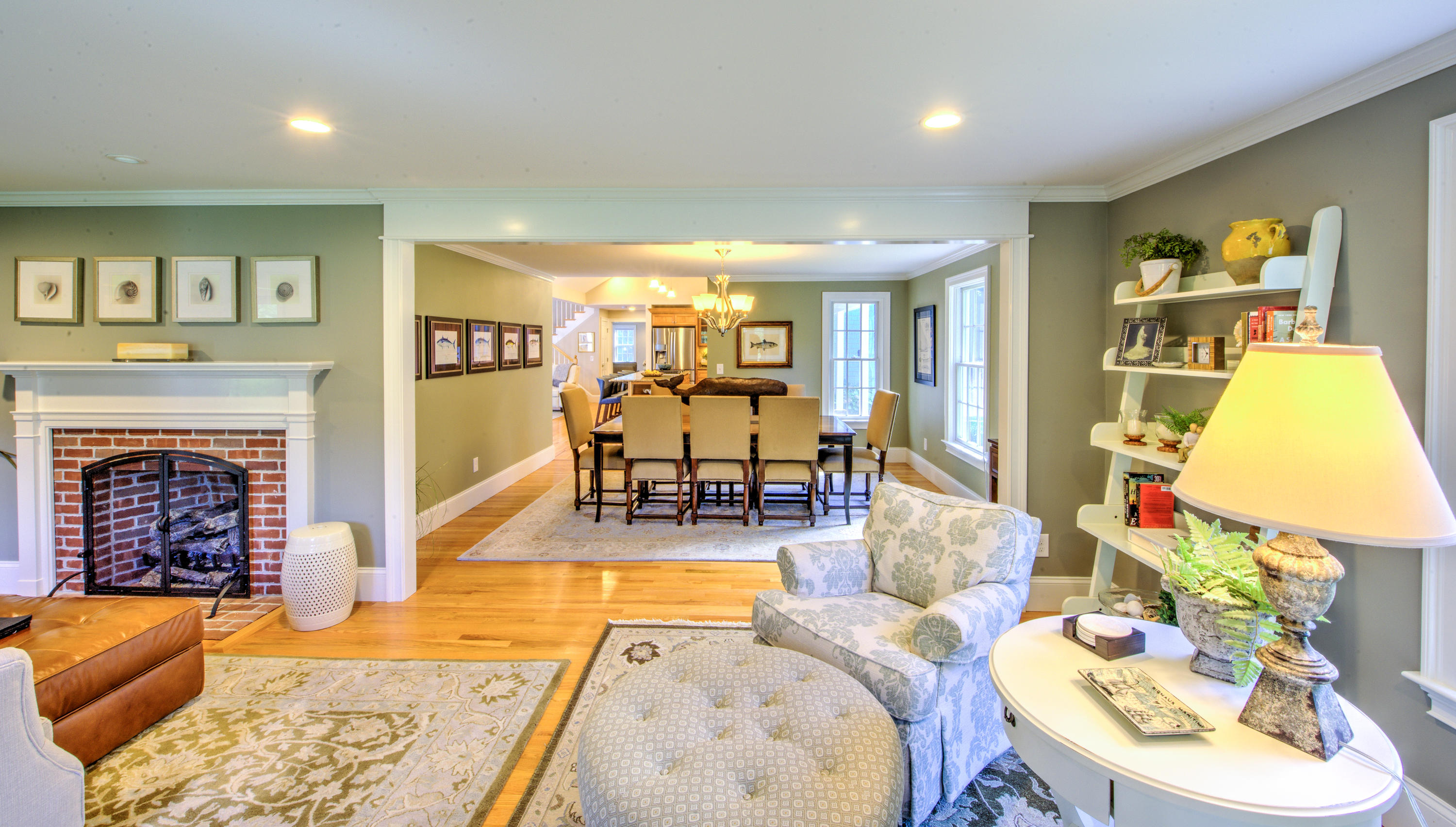 4 Hill Creek Road Centerville, MA 02632 - Photo 11 of 27 a living room with furniture and a fireplace