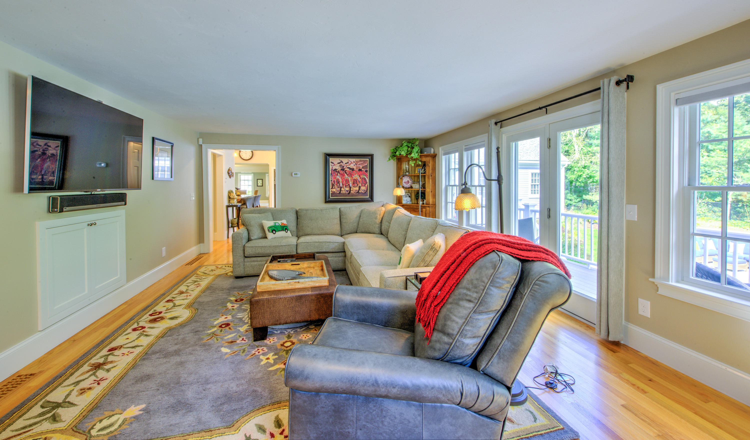 4 Hill Creek Road Centerville, MA 02632 - Photo 15 of 27 a living room with furniture and a flat screen tv