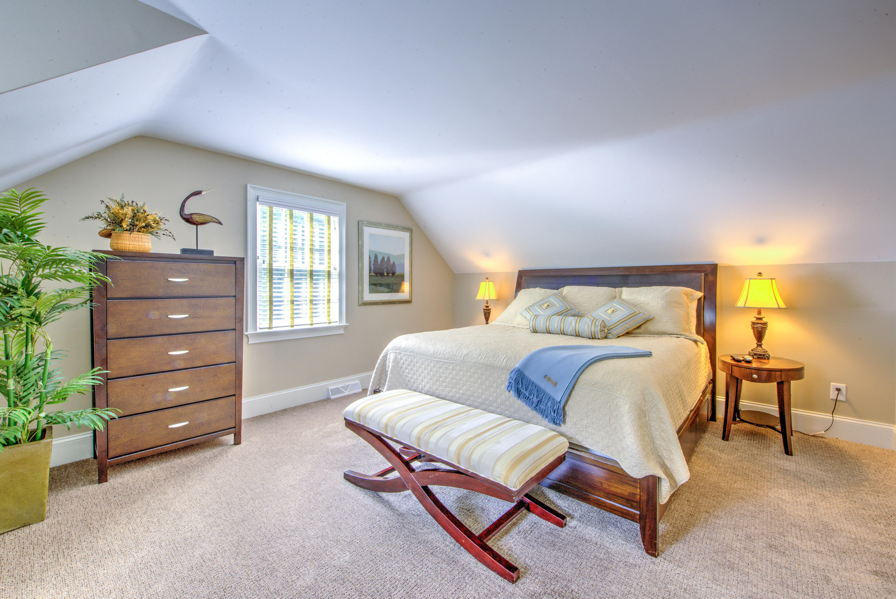 4 Hill Creek Road Centerville, MA 02632 - Photo 23 of 27 a bedroom with a bed and a dresser