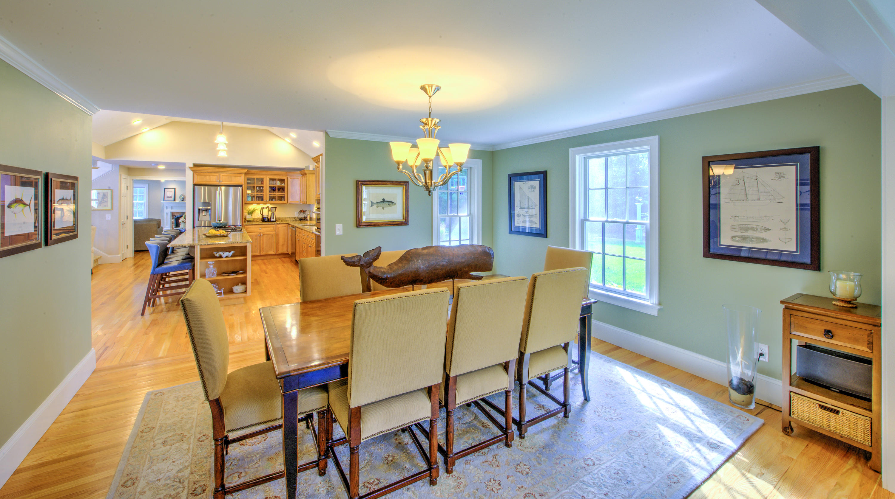 4 Hill Creek Road Centerville, MA 02632 - Photo 7 of 27 a view of a dining room with furniture and chandelier