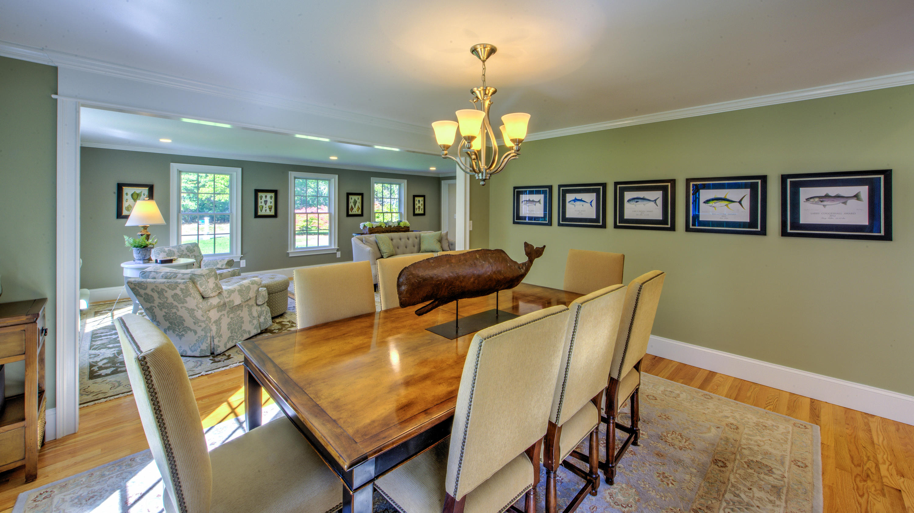 4 Hill Creek Road Centerville, MA 02632 - Photo 8 of 27 a view of a dining room with furniture and a chandelier