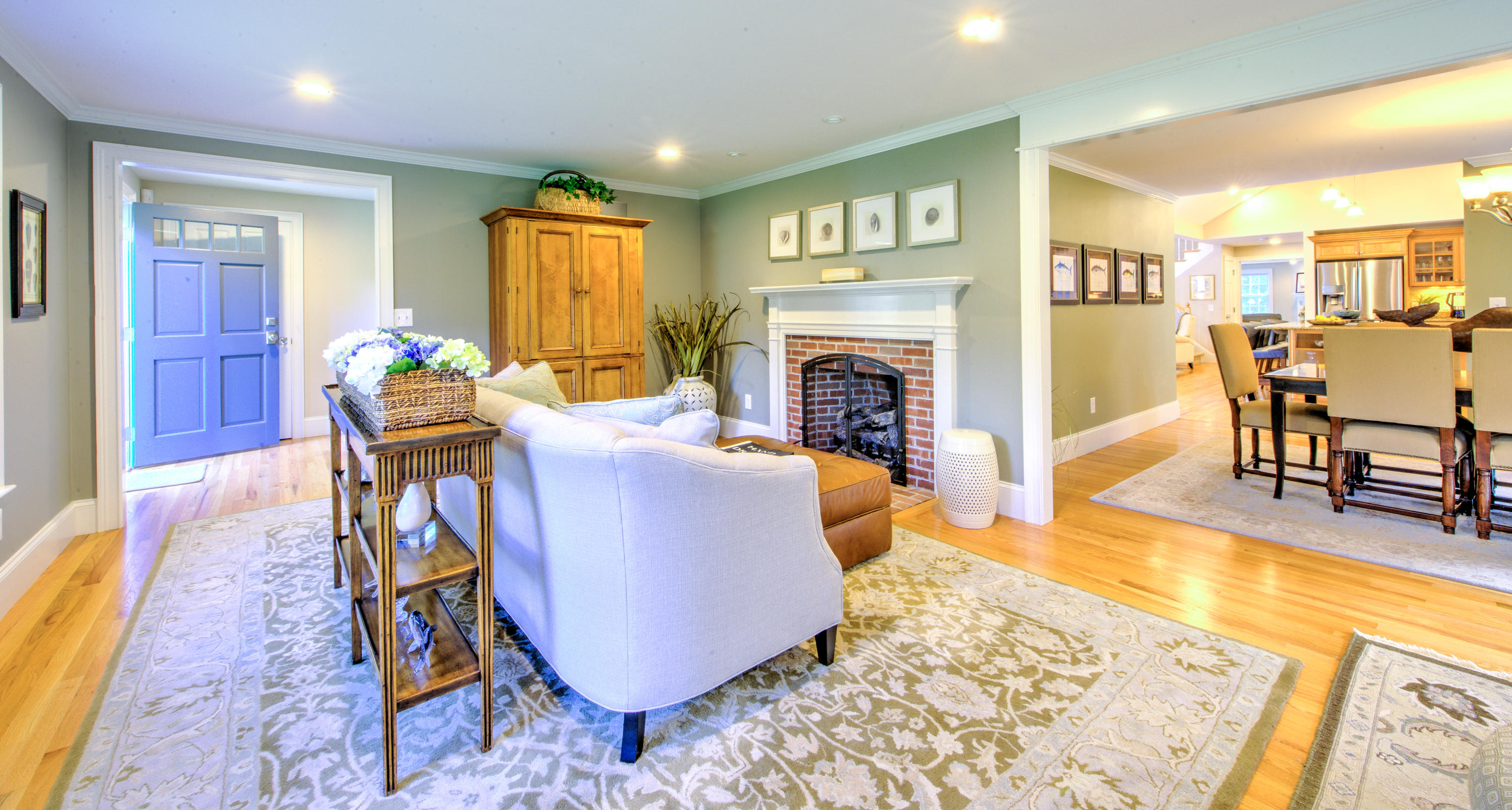 4 Hill Creek Road Centerville, MA 02632 - Photo 10 of 27 a living room with furniture and a fireplace