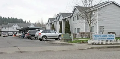 a view of street with parked cars