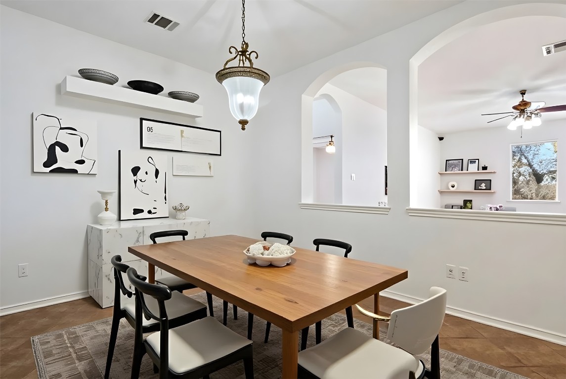 601 Red Hawk Drive Leander, TX 78641 - Photo 13 of 40 Virtually staged - Dining area featuring ceiling fan and baseboards