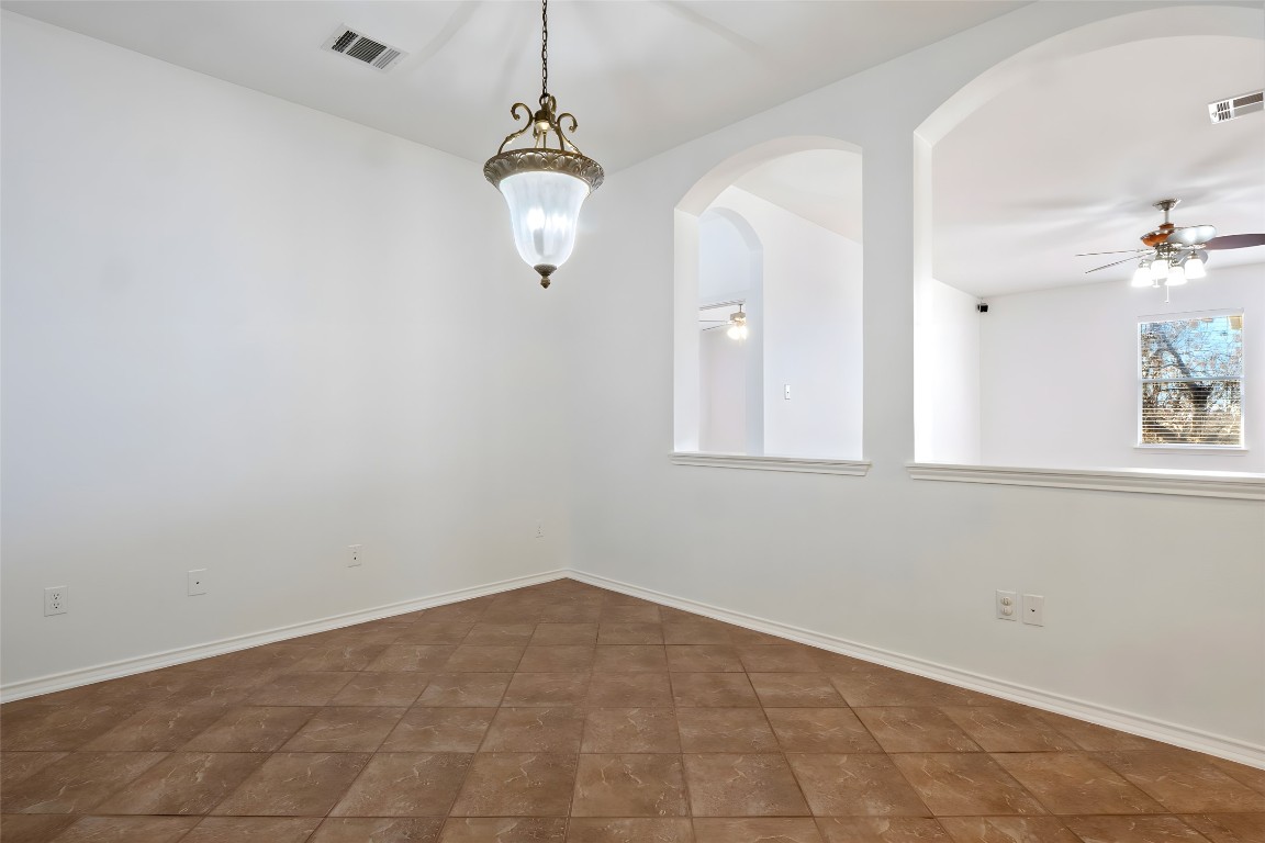 601 Red Hawk Drive Leander, TX 78641 - Photo 14 of 40 Dining area featuring ceiling fan and baseboards