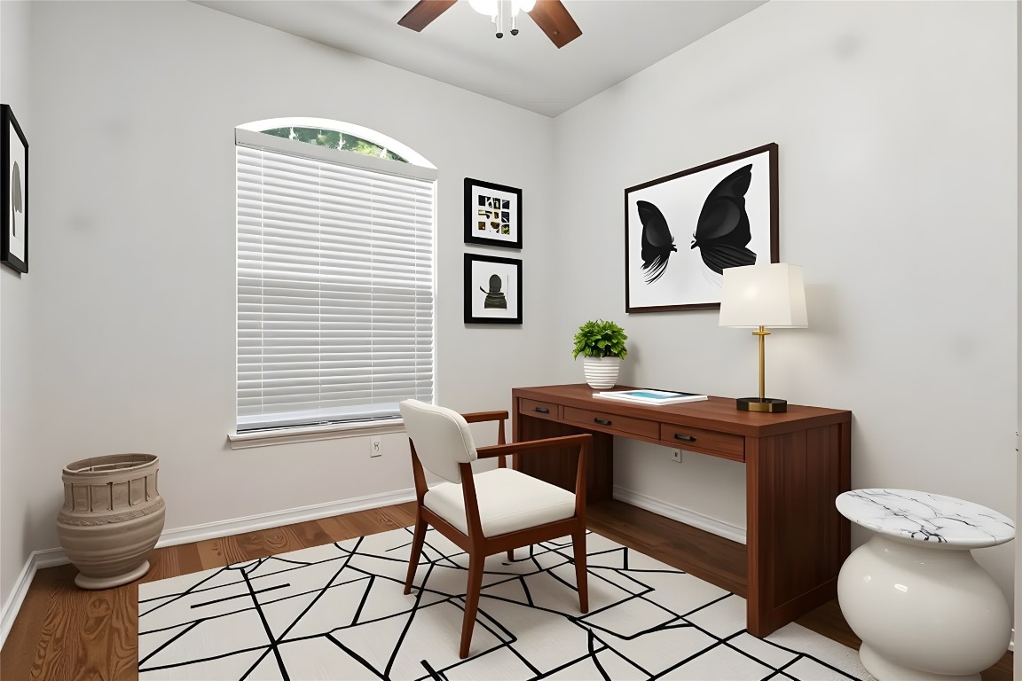601 Red Hawk Drive Leander, TX 78641 - Photo 25 of 40 Virtually staged - Bedroom #2 with light wood finished floors and ceiling fan