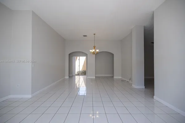 a view of a room with an entryway
