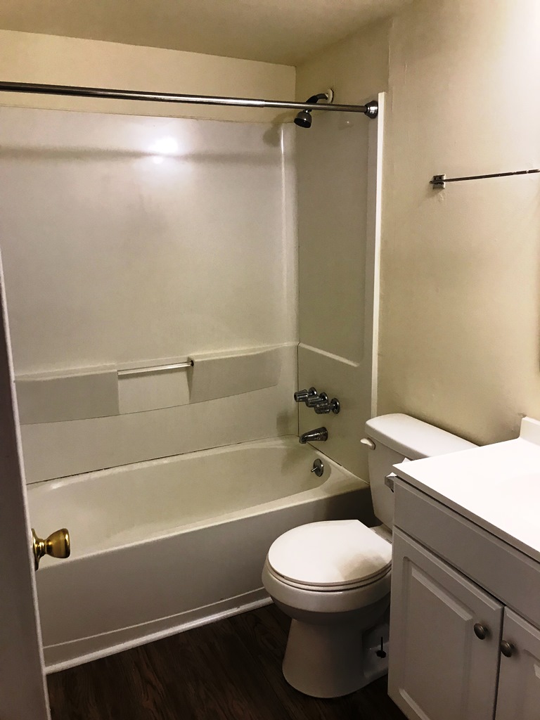 406 Old Central Road, Unit 1 Clemson, SC 29631 - Photo 2 of 8 This bathroom features a shower and tub combination, along with a vanity for convenience.
