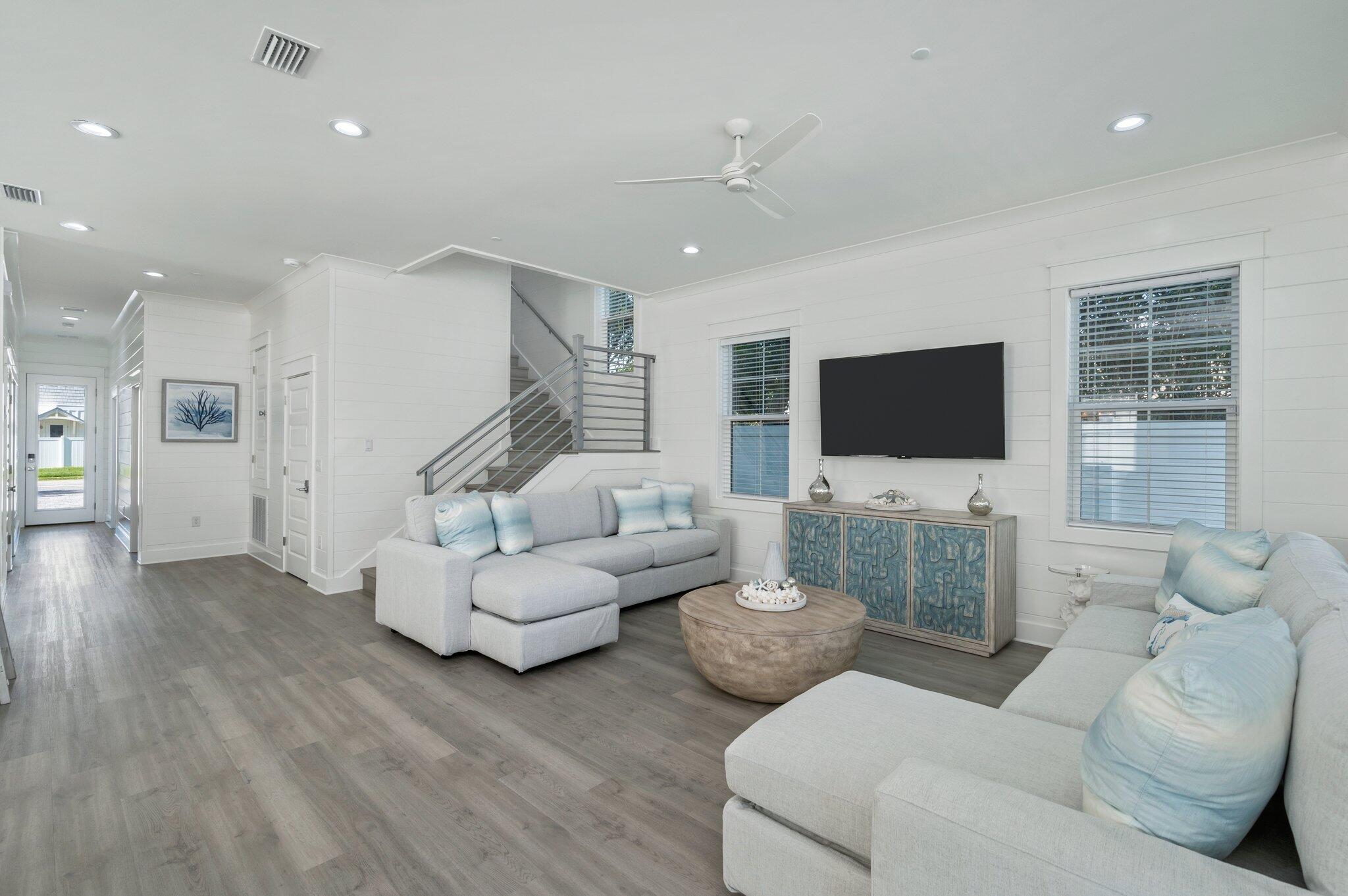 4553 Luke Avenue Destin, FL 32541 - Photo 11 of 70 a living room with furniture and a flat screen tv