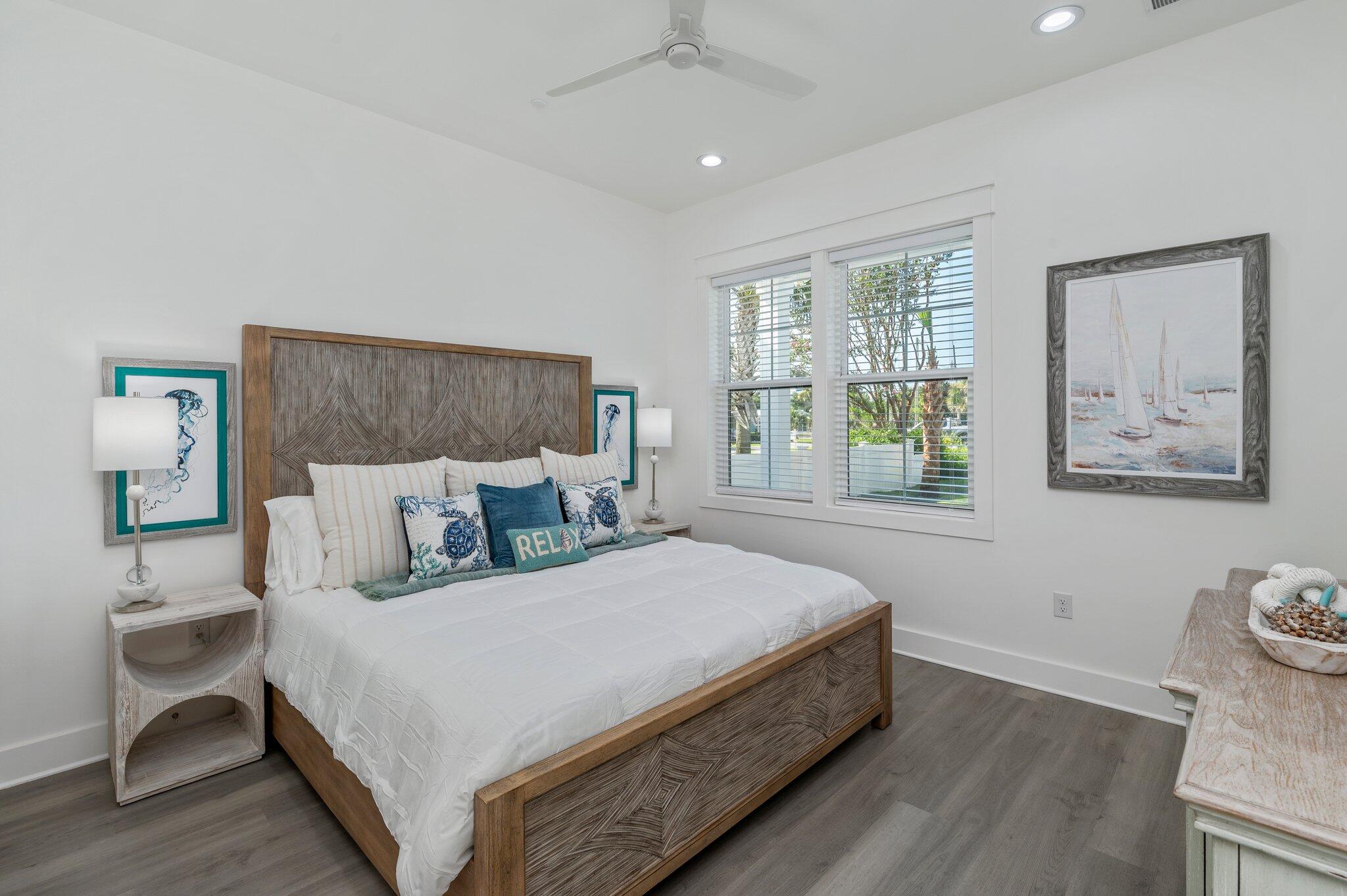 4553 Luke Avenue Destin, FL 32541 - Photo 22 of 70 a bedroom with a large bed and a window